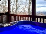 Hot tub overlooking the mountain view